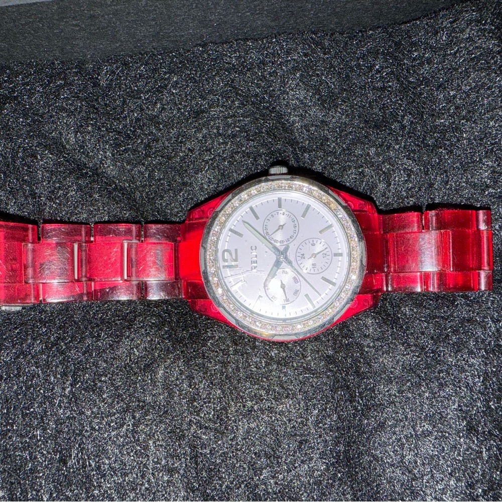 Pink Fossil Watch with plastic band.